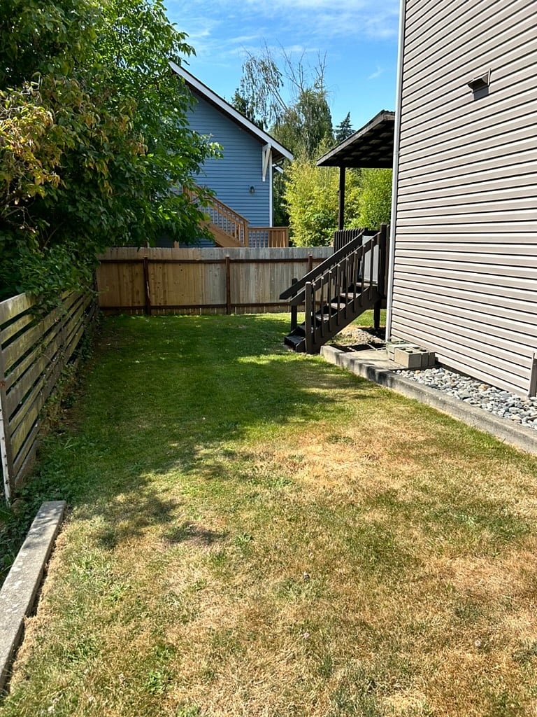 Side yard with access to your patio