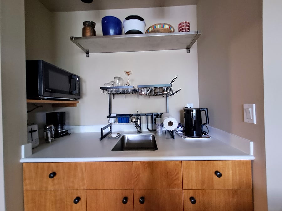kitchen sink, microwave, coffee maker, electric kettle