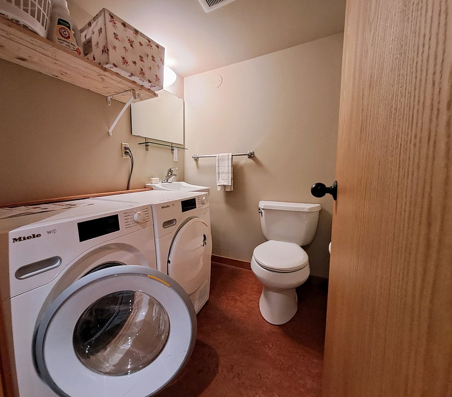 laundry room is also second bathroom