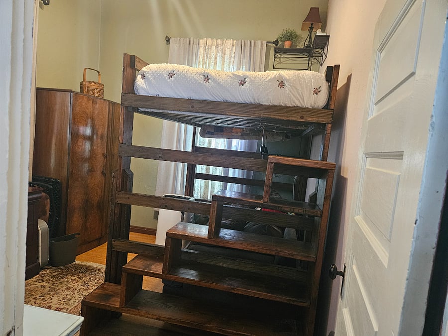 Stairs going to loft bed