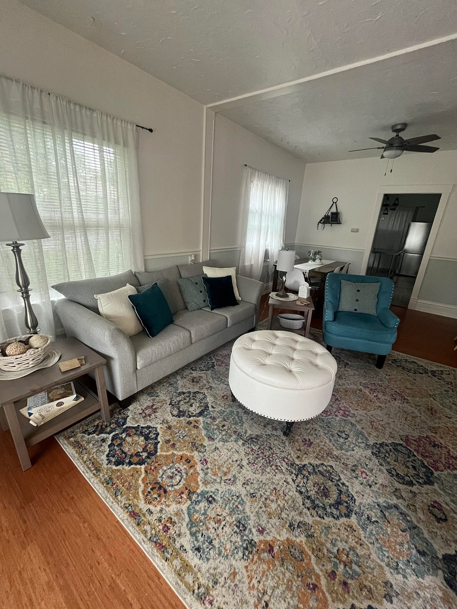 Footstool stores blankets and full sized couch is comfortable and clean