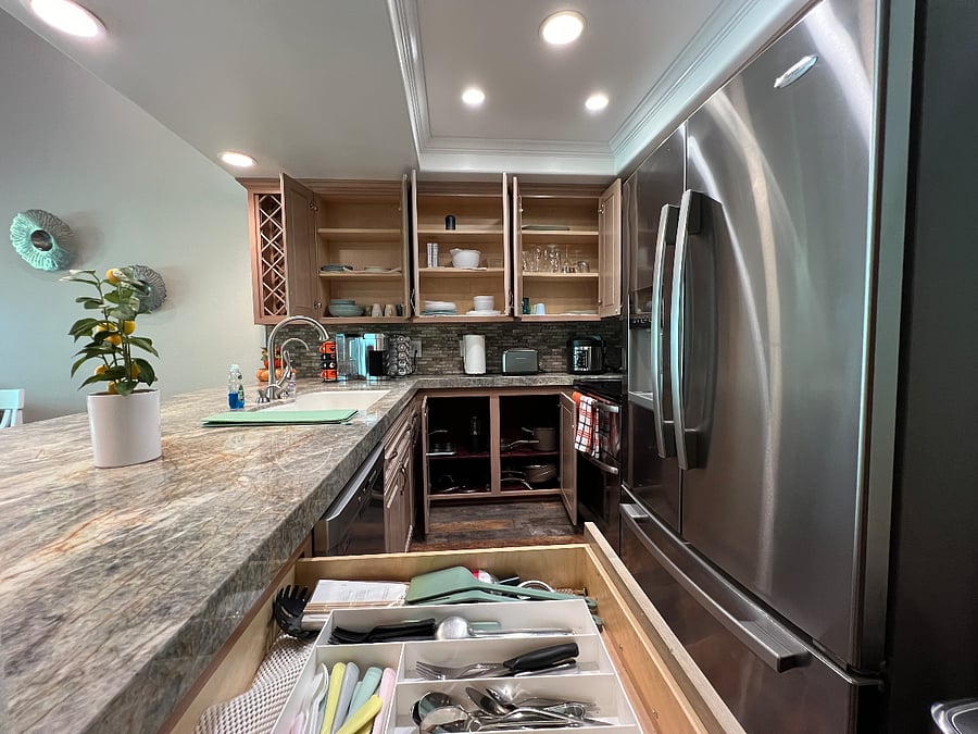 Fully Stocked Kitchen with cabinets open display