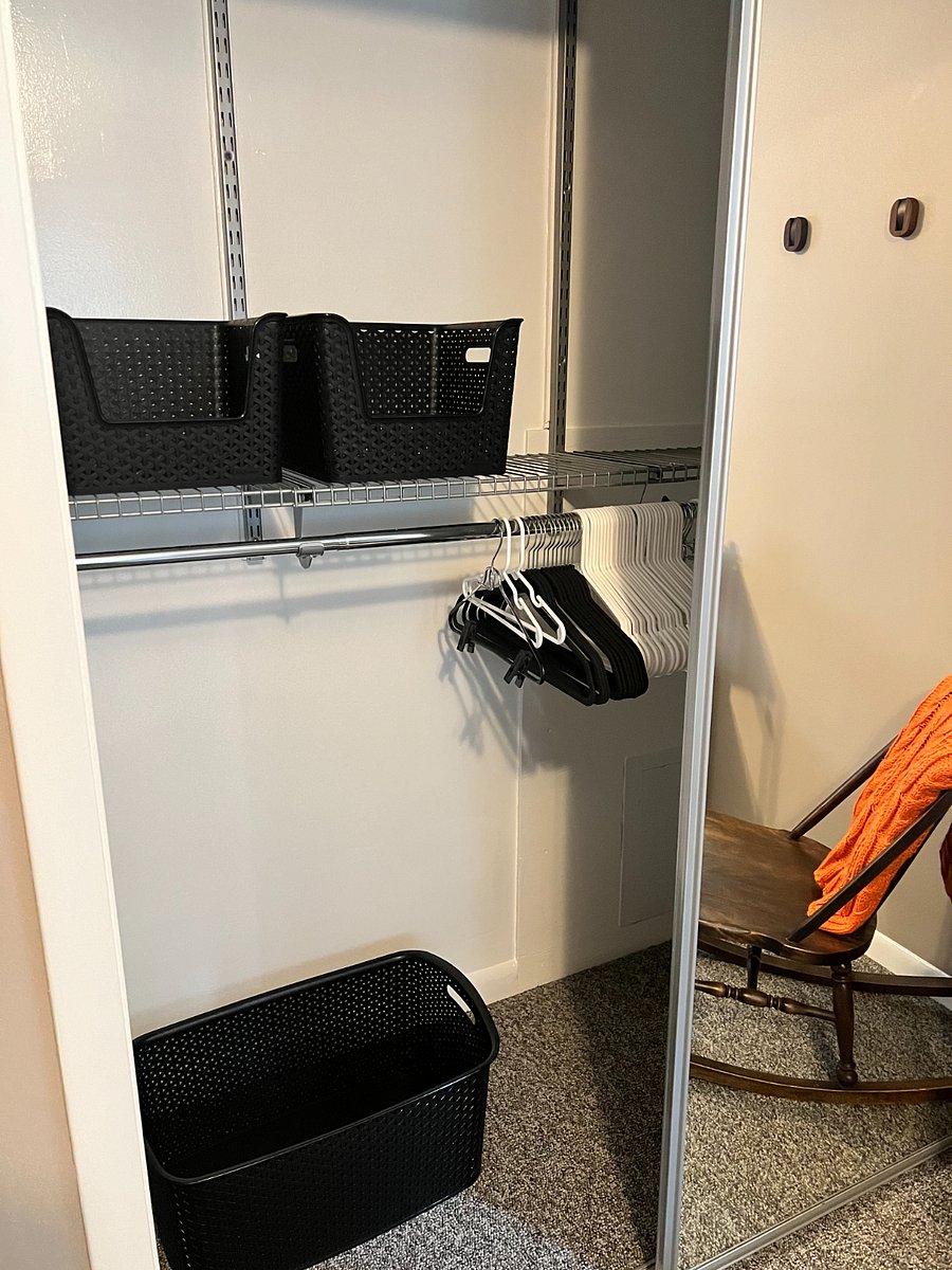 Mirrored closets feature lots of room for hanging clothes and storing smaller items.