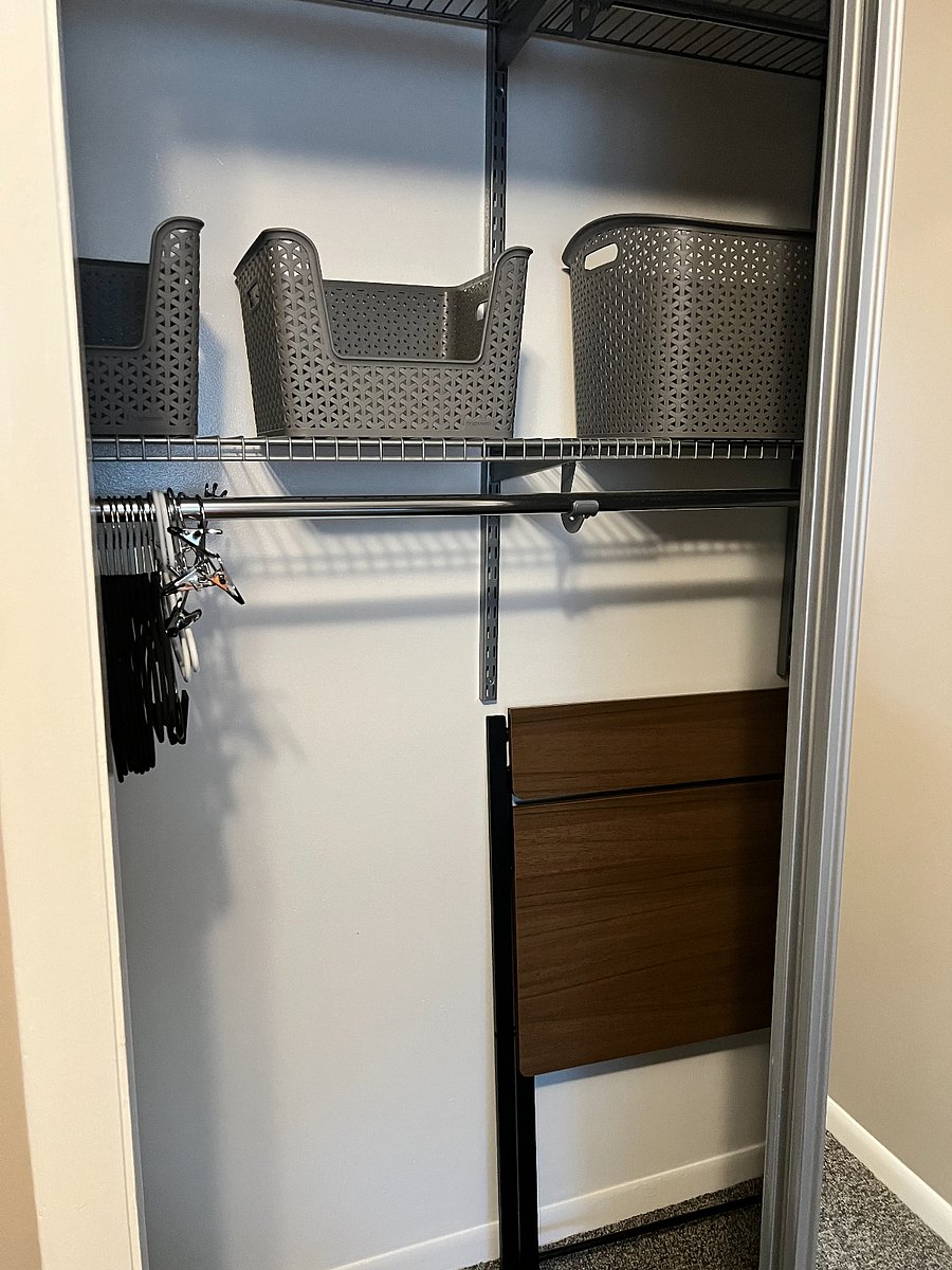 Lots of options for personal clothing items in the rear bedroom closet. We also have a portable folding desk for working at home!