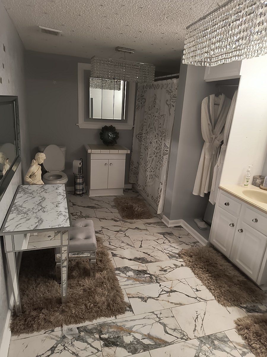 Located in the rear of the house is Our MGM Area is the Master bathroom, We name it The MGM  bathroom 