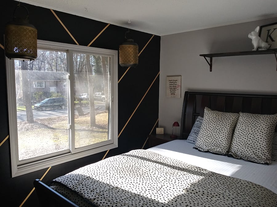 Curtains have been installed in the bedroom