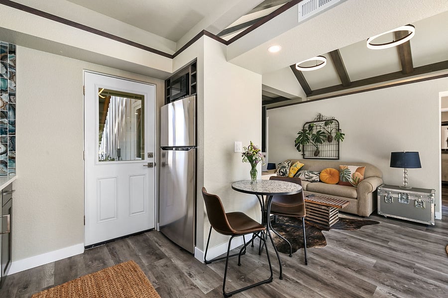 entry into kitchen Note door next to the laundry leads to attached heated 1 car garage!