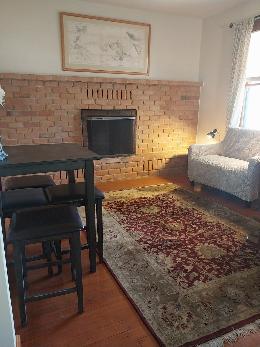 Fireplace with sitting area and dining area
