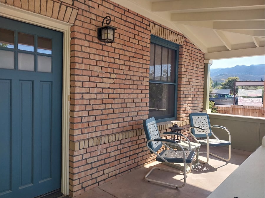 Large front porch overlooking the city park