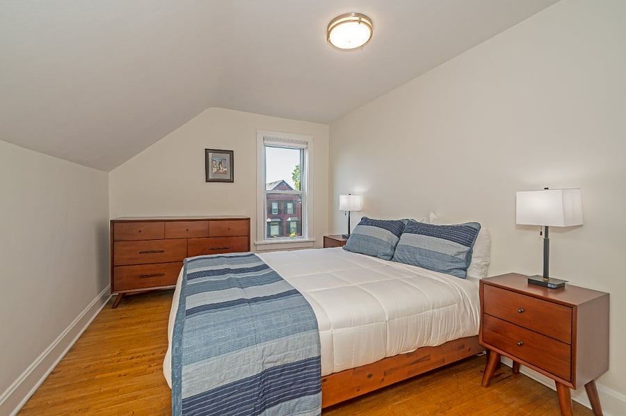 This room features a queen bed and all new linens and furniture