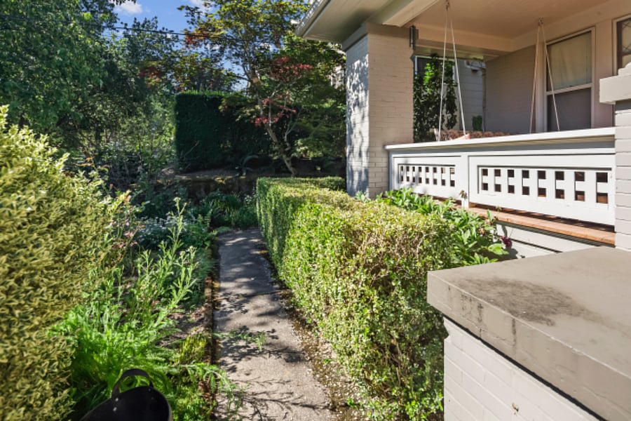 Path to entrance, from front of house.