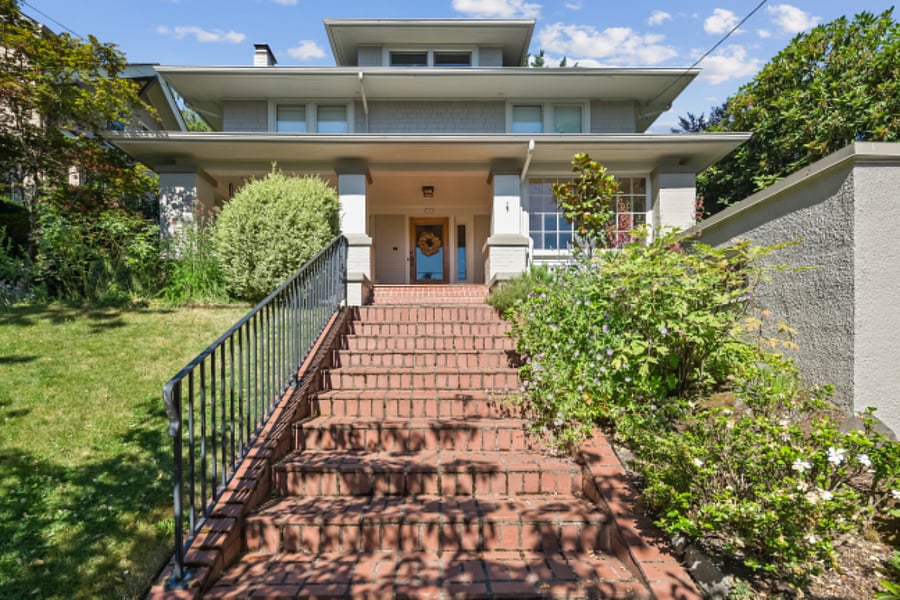 Front of house; daylight suite access is along the left side of the property.