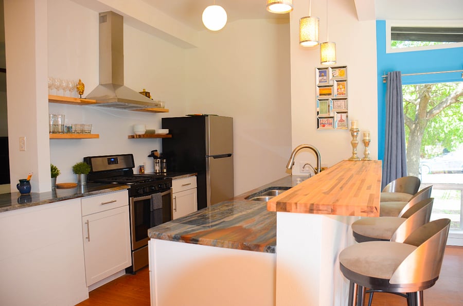 New fridge, stove and dishwasher, water filter system at sink, granite countertops
