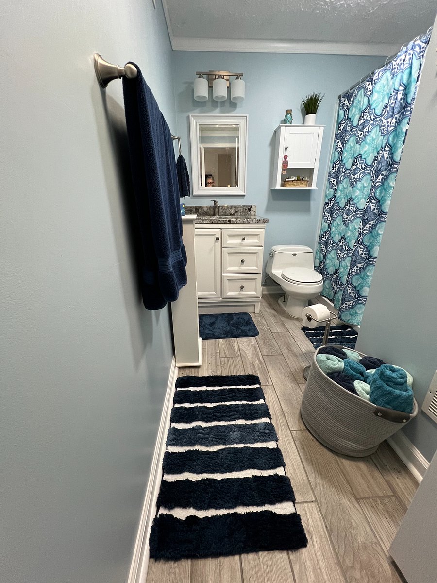 Extra lighting above the sink to help when putting on make-up and additional heating fan on timer for when you step out of the shower if you'd like.