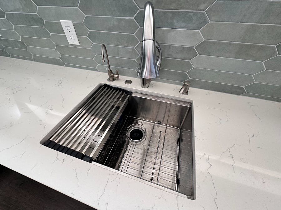 beautiful brand new undermount sink with built-to-fit grates for washing and chopping food. filtered water attached. all water is 12-step reverse osmosis AND goes through a softener.