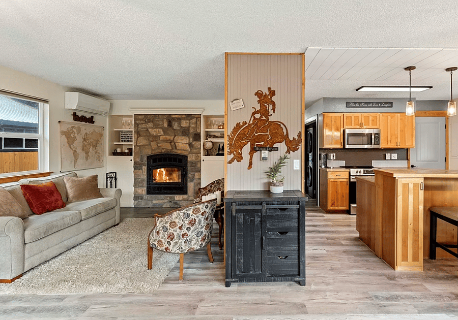 Shared livingroom with wood-burning fireplace. 
