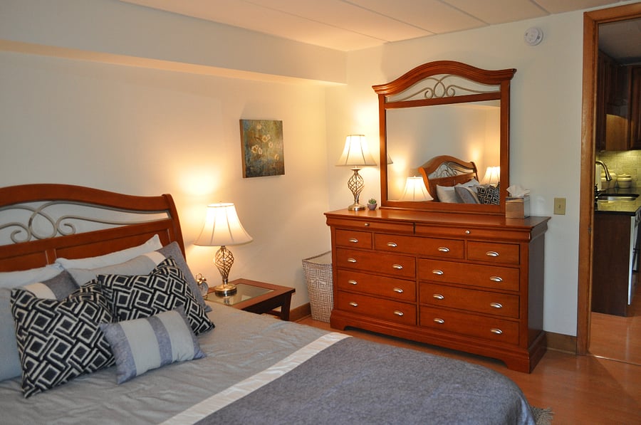 Full dresser with a large mirror.