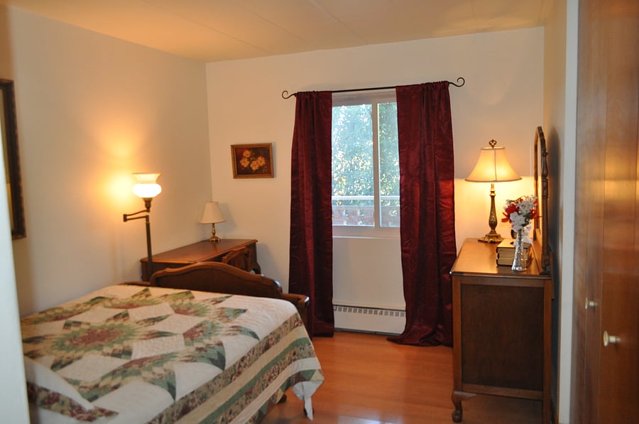 The second bedroom is currently configured with a full bed, desk and dresser.  The bed can be removed, we are happy to customize this room but it will require use of the storage space in the basement.