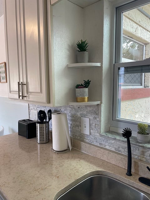 Kitchen details, with modern faucet.