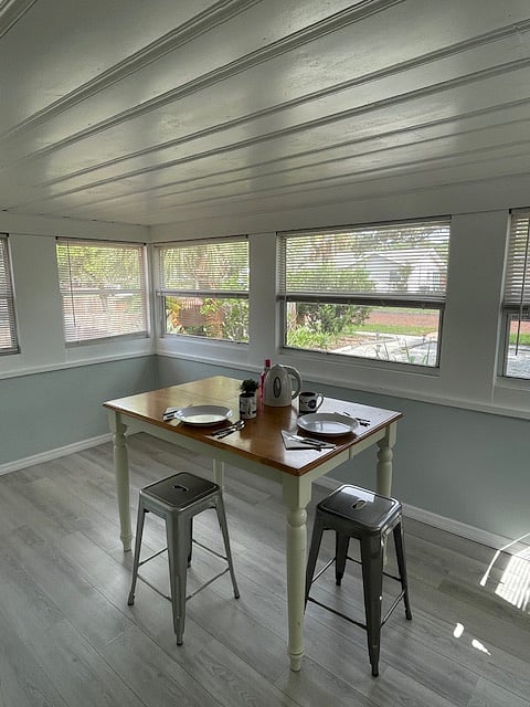 Bonus sunroom, set up as a dining room but plenty of potential as another office or workout space. Plenty of natural light.
