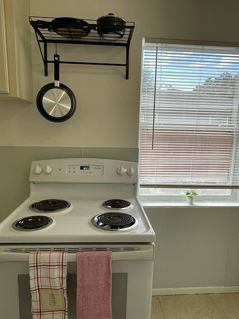 Full size electric stove with auto shut off burners.