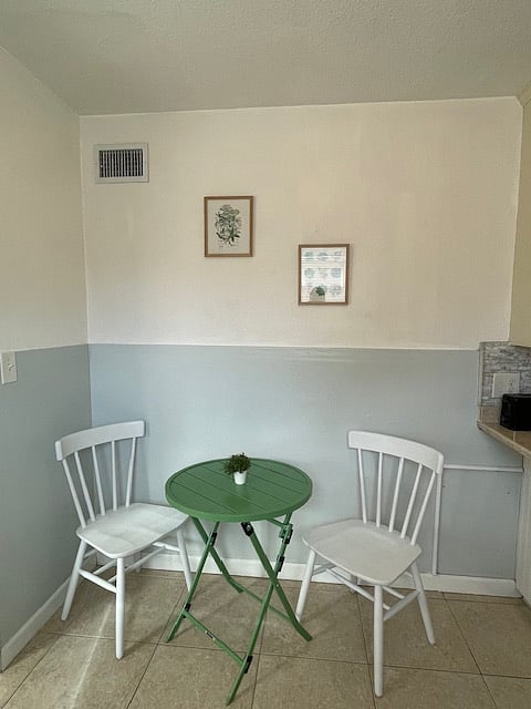 Cafe seating for dining or workspace.