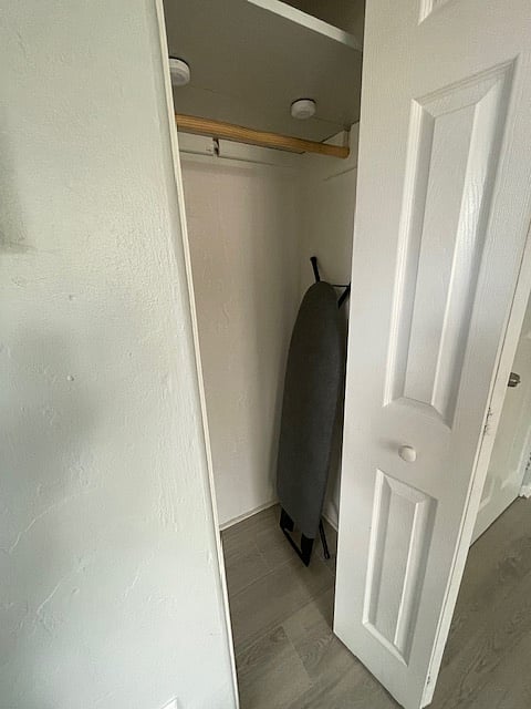 Full size ironing board included.