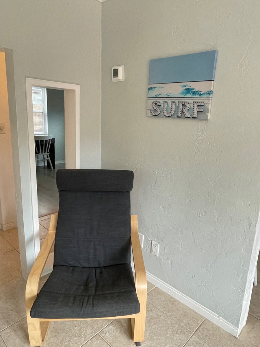 Living room with plenty of seating.