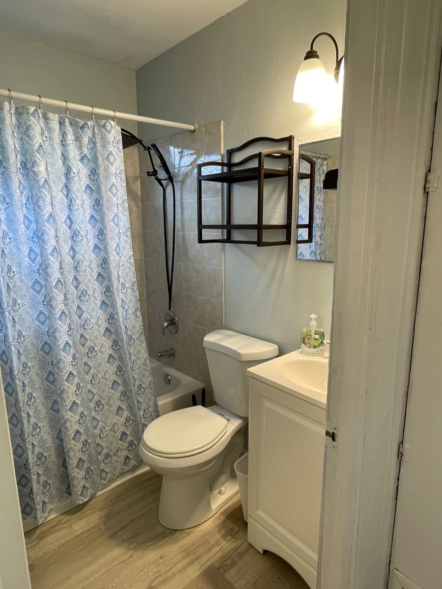 Full bath with storage.