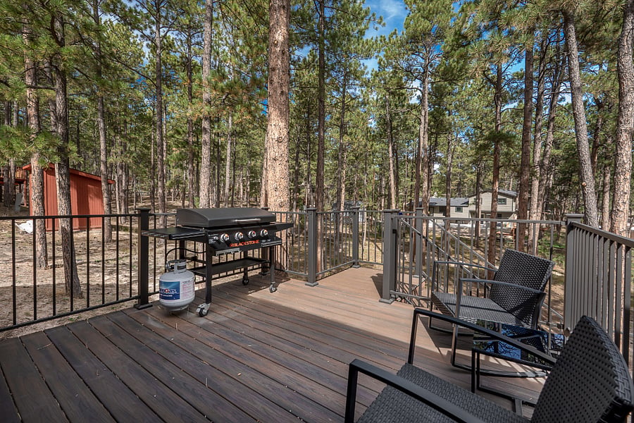 Outdoor space with grill and sitting area
