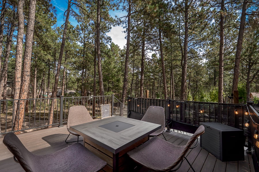 Outdoor space with propane fireplace and sitting area