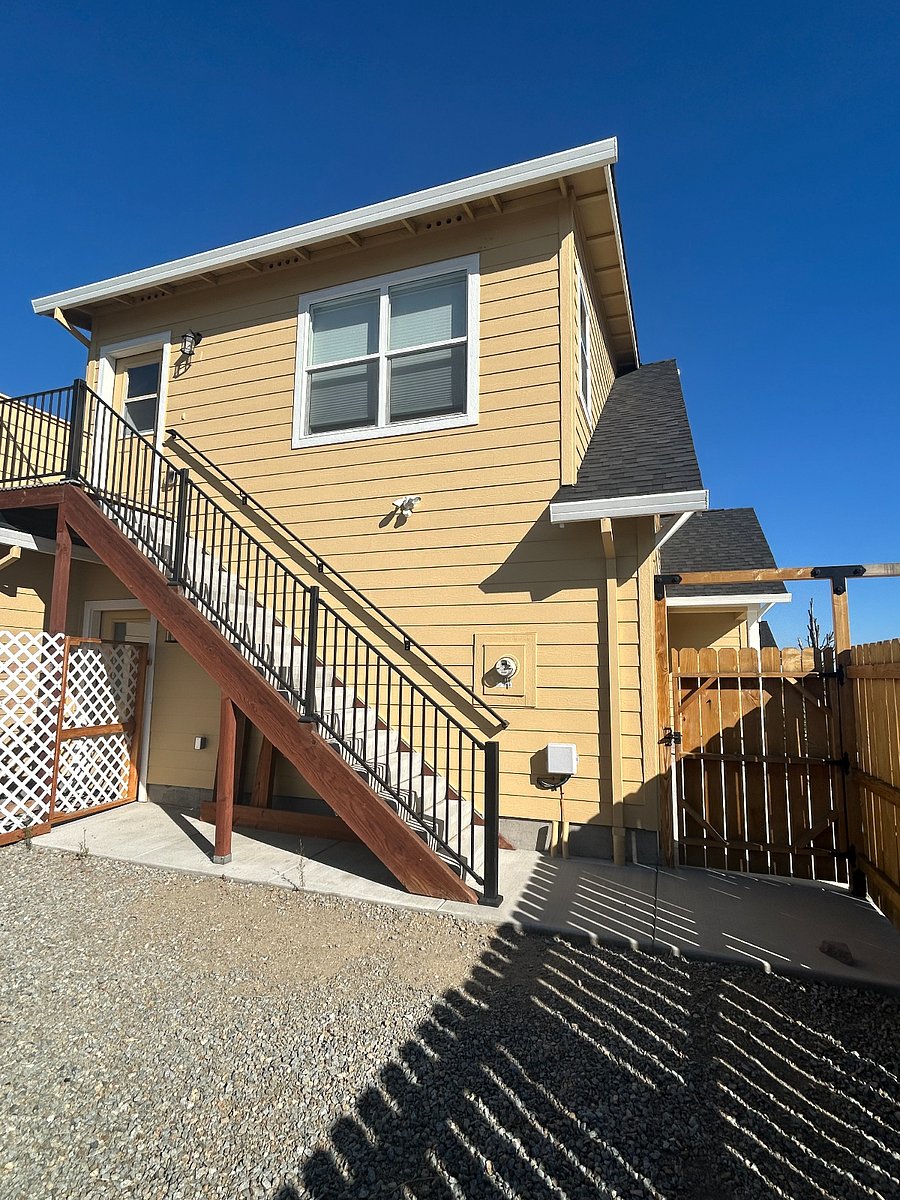 Entrance to rental. Motion detection flood light and private gate for security.
