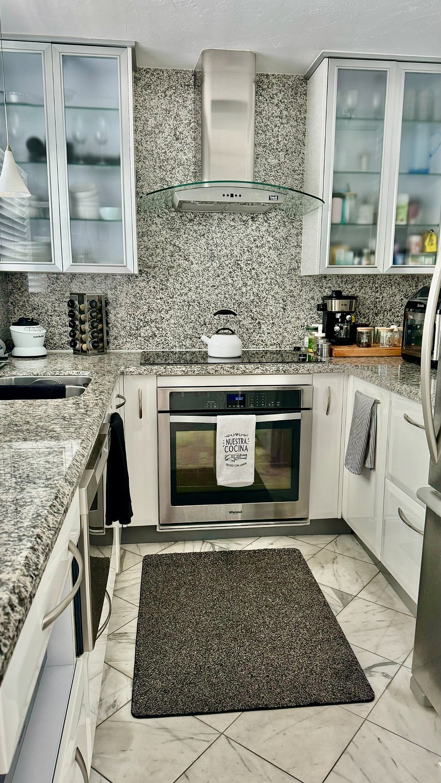 Full size oven and beautiful glass cooktop w/ 5 burners and quick heat.
