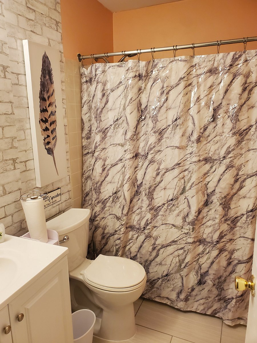 1 of 2 pictures of shared bathroom