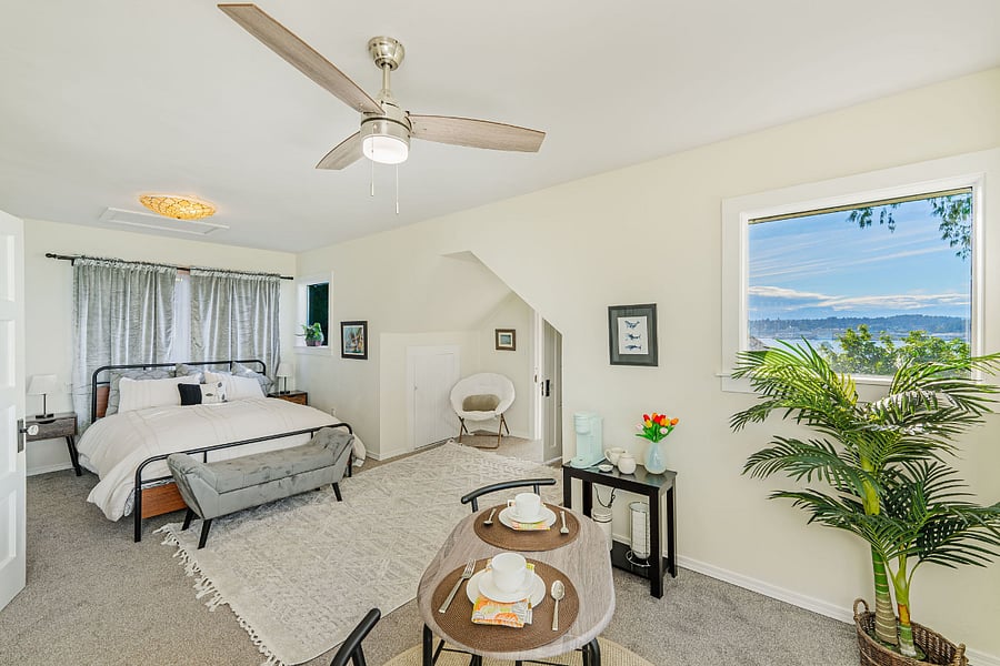 Master bedroom with bistro area and breathtaking view of the sound
