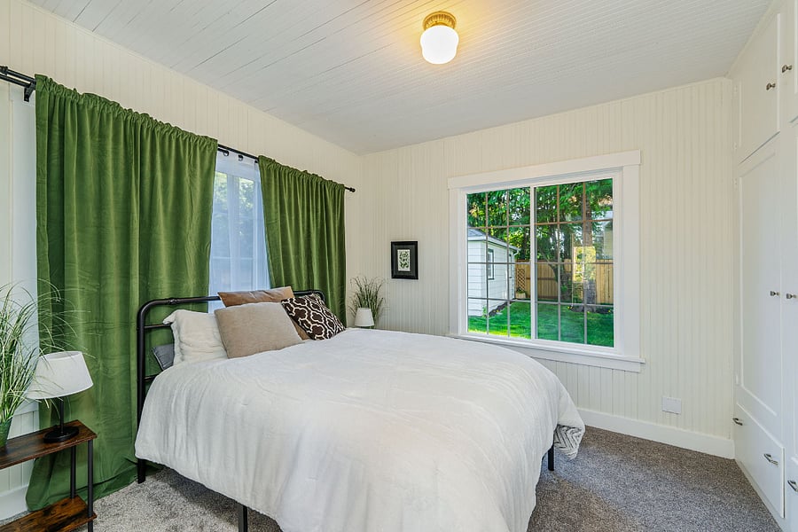 Downstairs bedroom with a new queen bed