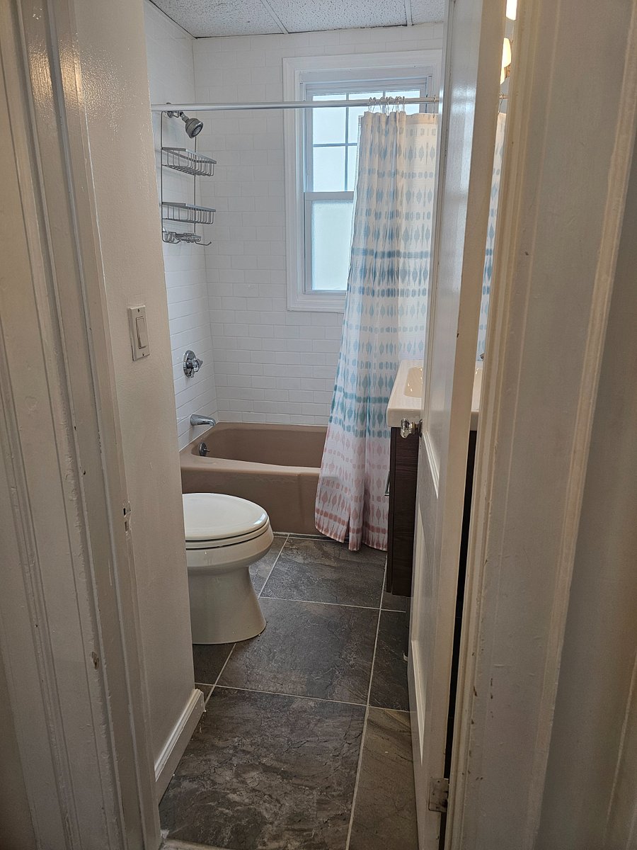 Full bathroom with tub and shower