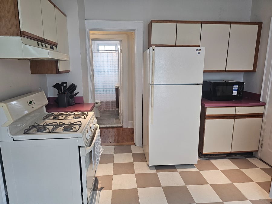 Large kitchen with cooking amenities included (cups, plates, pots, utensils, etc.)