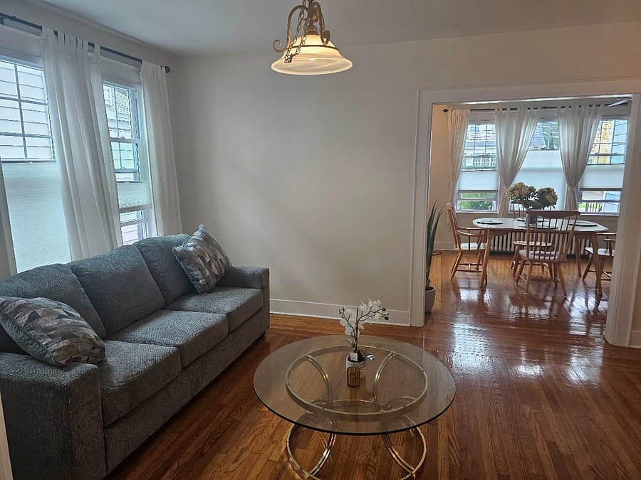 Spacious living room with smart TV and wifi.