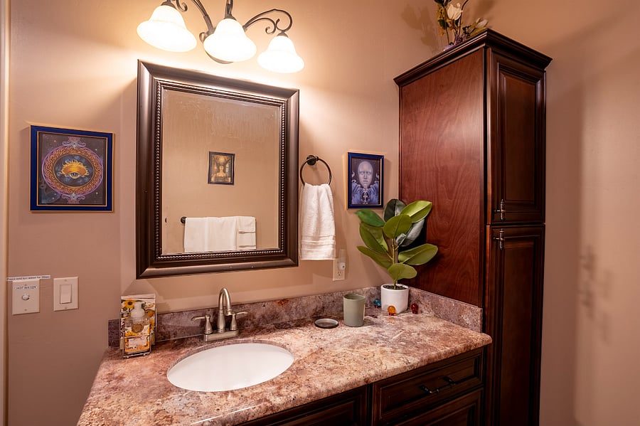 East side middle bathroom.