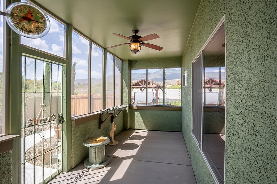 East side screen house patio with pet door access and sun bathing beds for Catio 