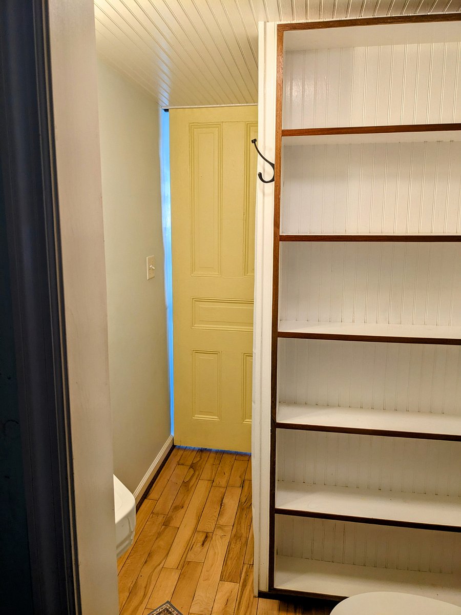 Sliding door offers privacy in the bathroom
