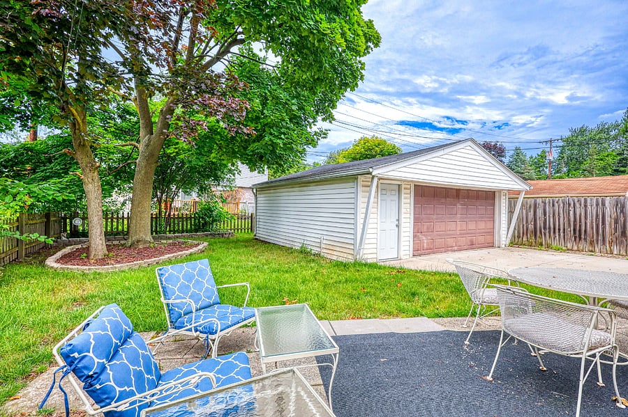 Backyar with 2.5 car garage and patio
