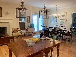 Kitchen w/ dining area, dishwasher, convection microwave, gas stove top, electric oven, double sink, full refrigerator, walk in pantry, screen porch off kitchen.