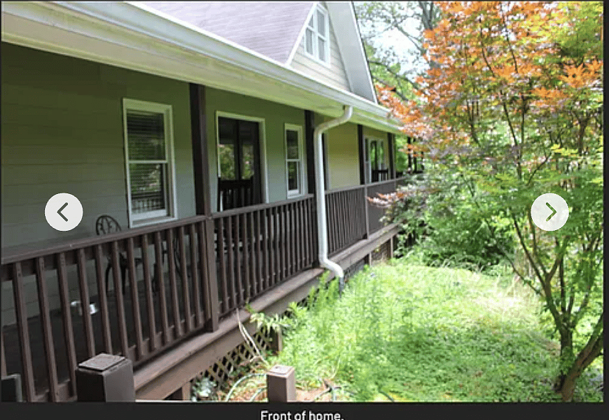 Wrap around porch with rocking chairs, to relax & enjoy the views of the pastures. 
