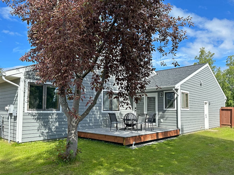 Backyard view with rented room window on left