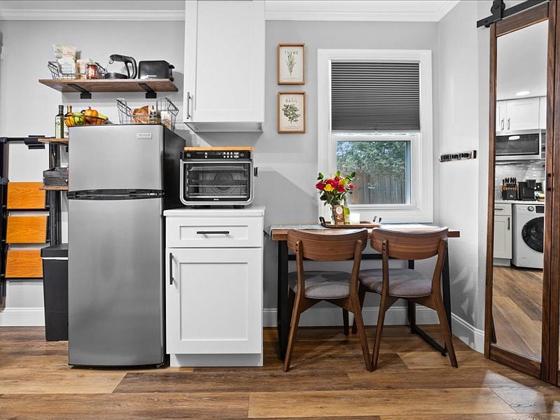 A Ninja Foodi 13 in 1 air frier and oven. This amazing appliance can roast, bake, air fry and much more. It is large enough to accommodate most frozen pizzas!