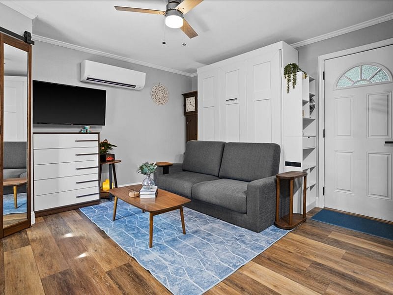 The coffee table folds and stores neatly while the bed is in use.