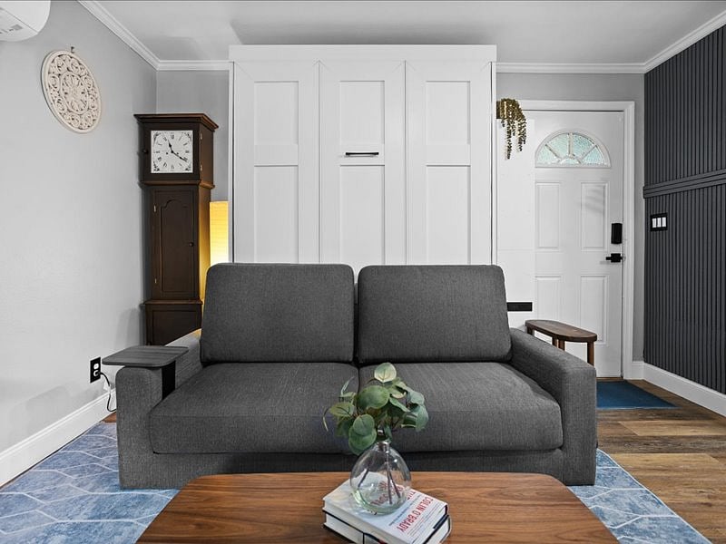 Storage is abundant and can be found in many places. This grandfather clock is actually a storage cabinet.