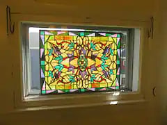 Stained glass in bathroom.